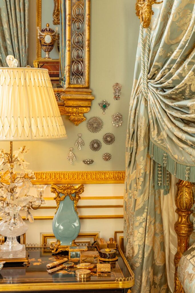 Jewels hung in group on the wall like small paintings